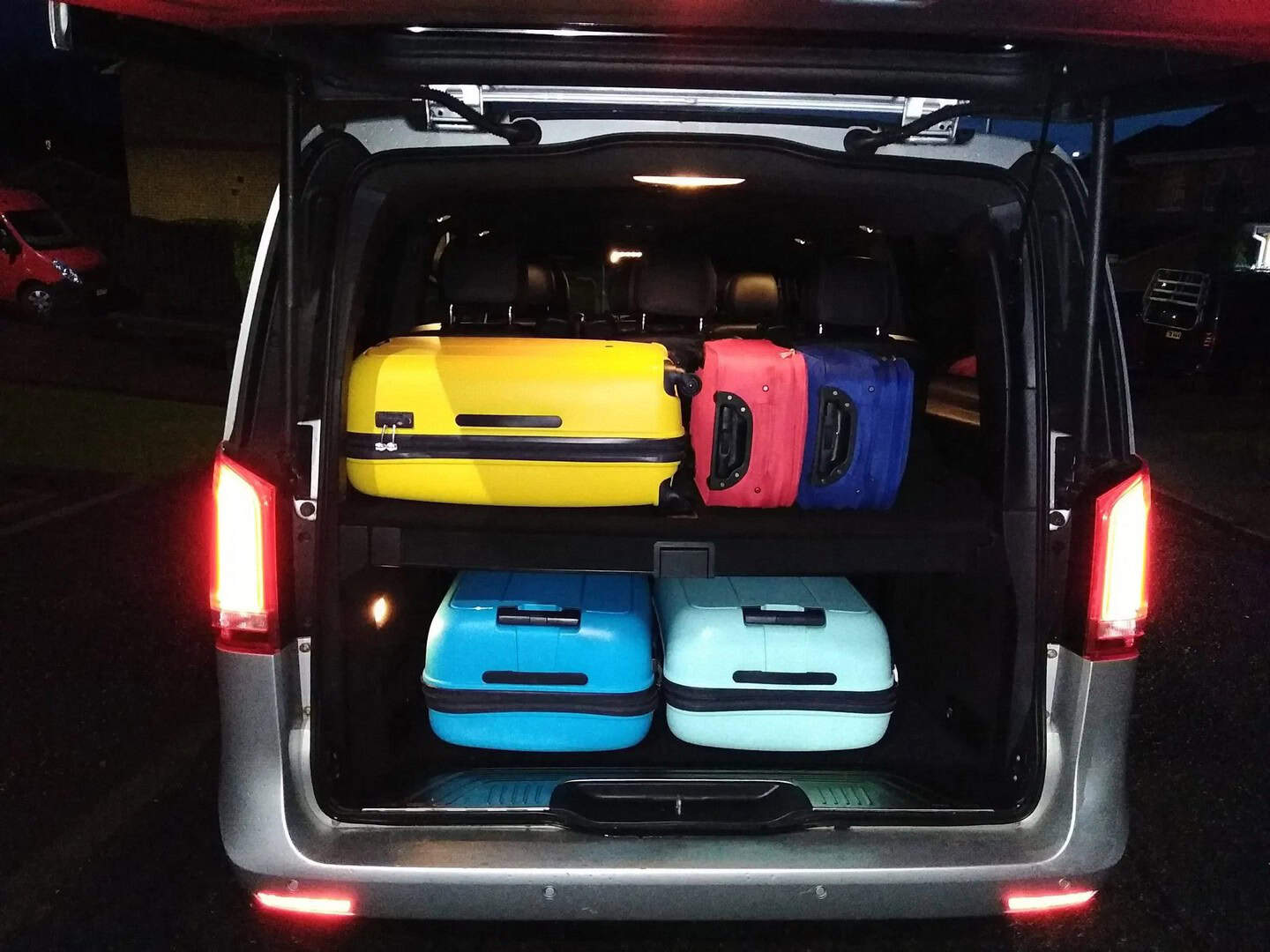 Luggage in back of van